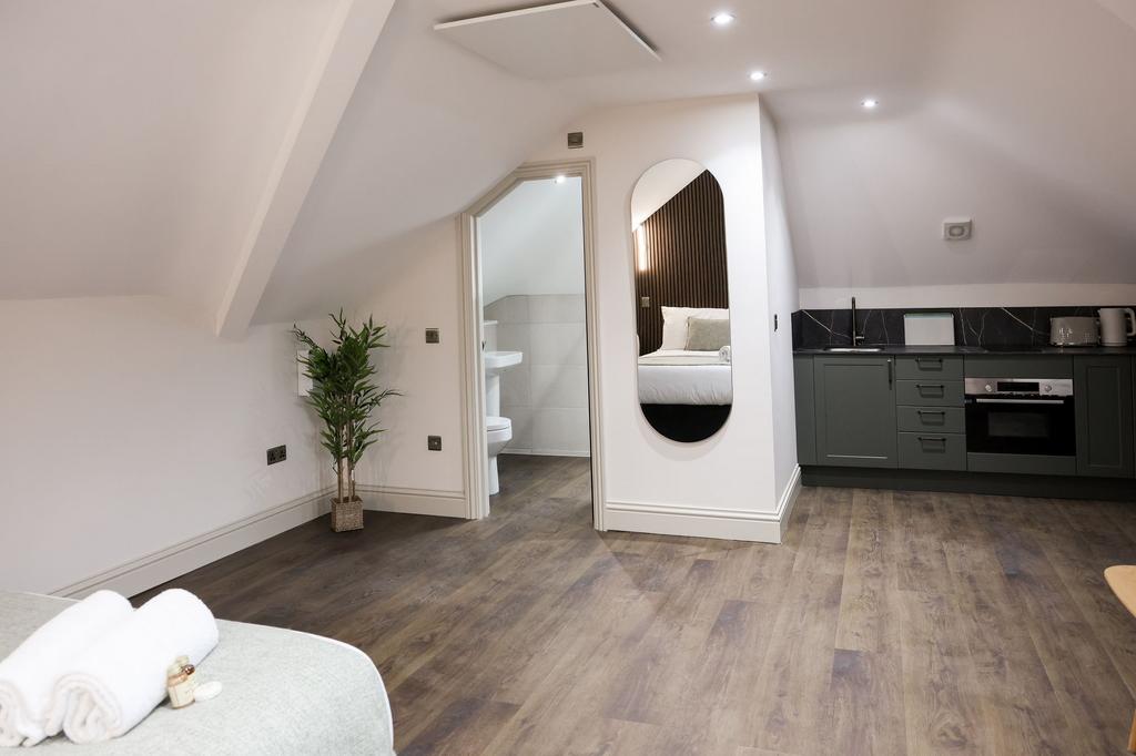 Bright, modern attic-style studio with kitchene...