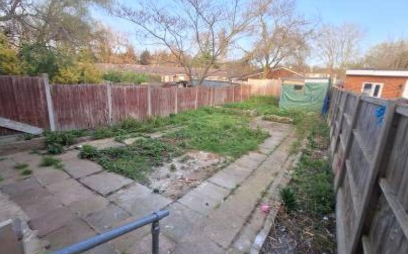 Private rear garden with patio and lawn...