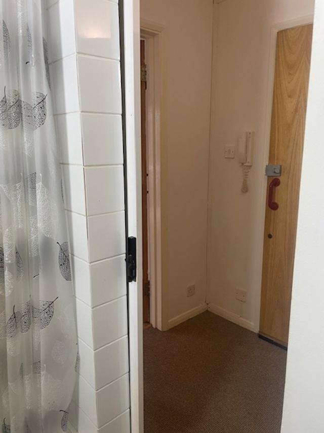 Small entrance hallway viewed from an adjacent ...