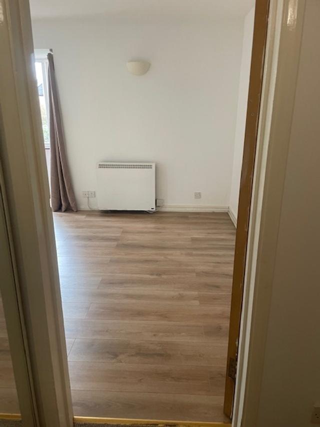 Bright, freshly refurbished living room with ne...