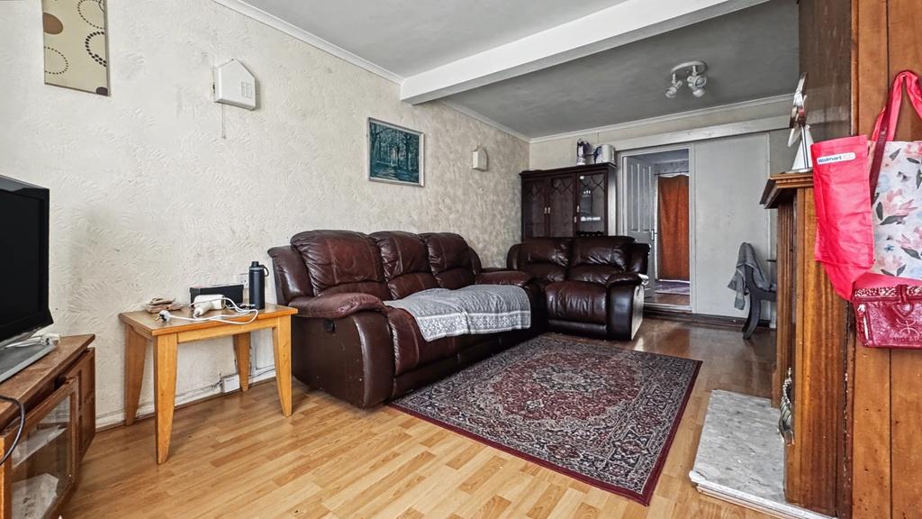 Comfortable lounge with leather seating and woo...