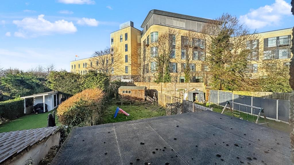 Rear garden with lawn and communal outdoor spac...
