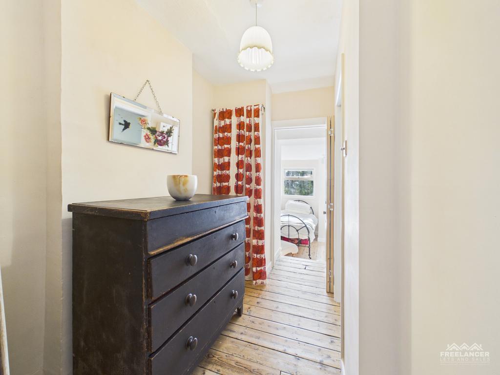Walkway to bedroom
