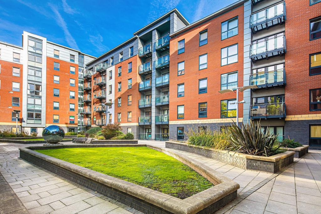 Well-maintained modern apartment courtyard with...