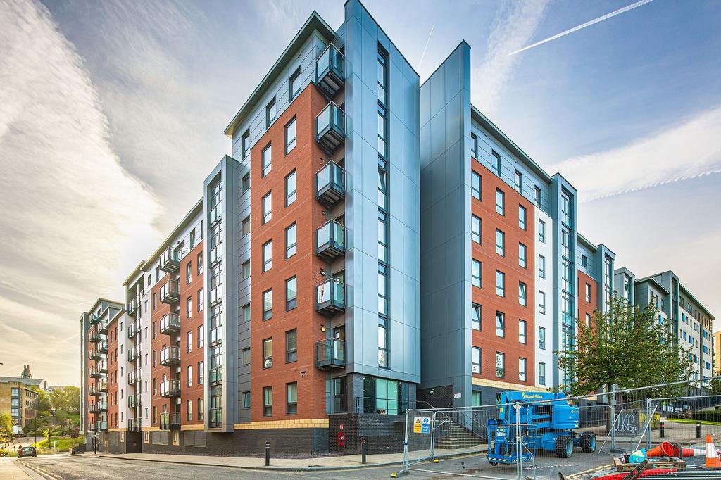 Modern multi-storey residential building with r...