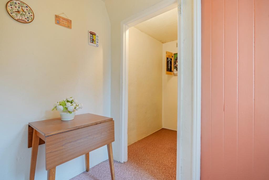 Rear Entrance Hallway With Storage Cupboard