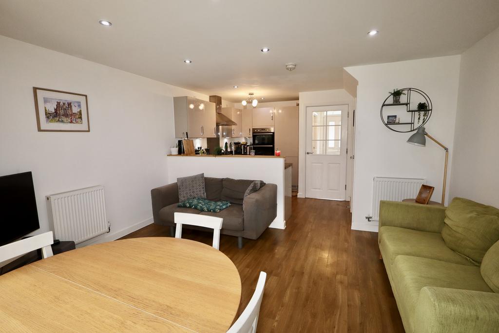 Dining area through to kitchen
