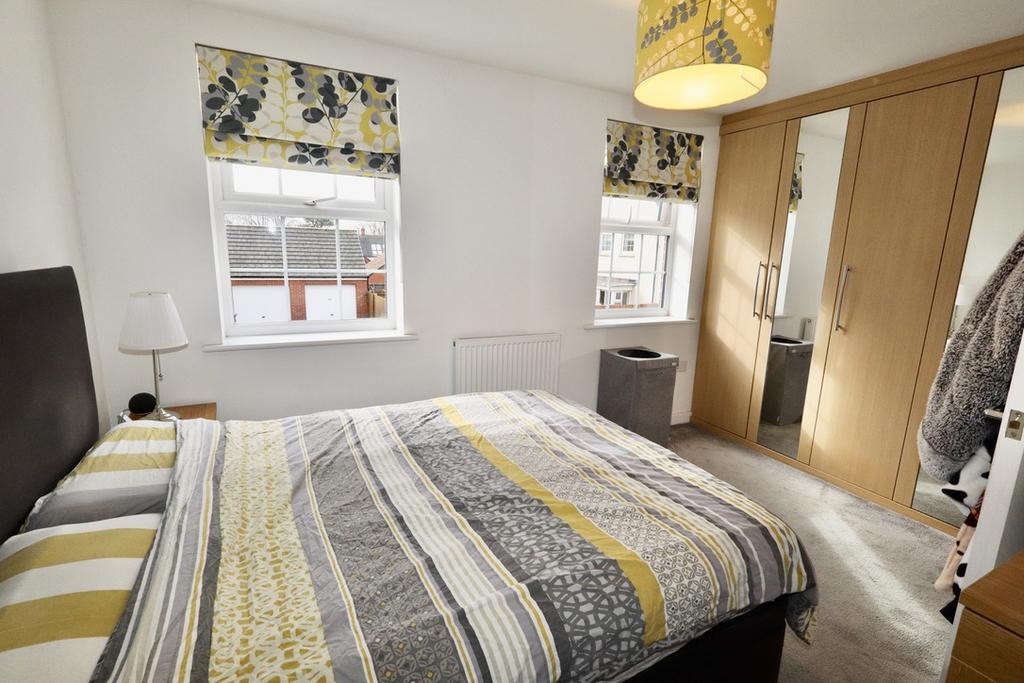Principle bedroom with fitted wardrobes