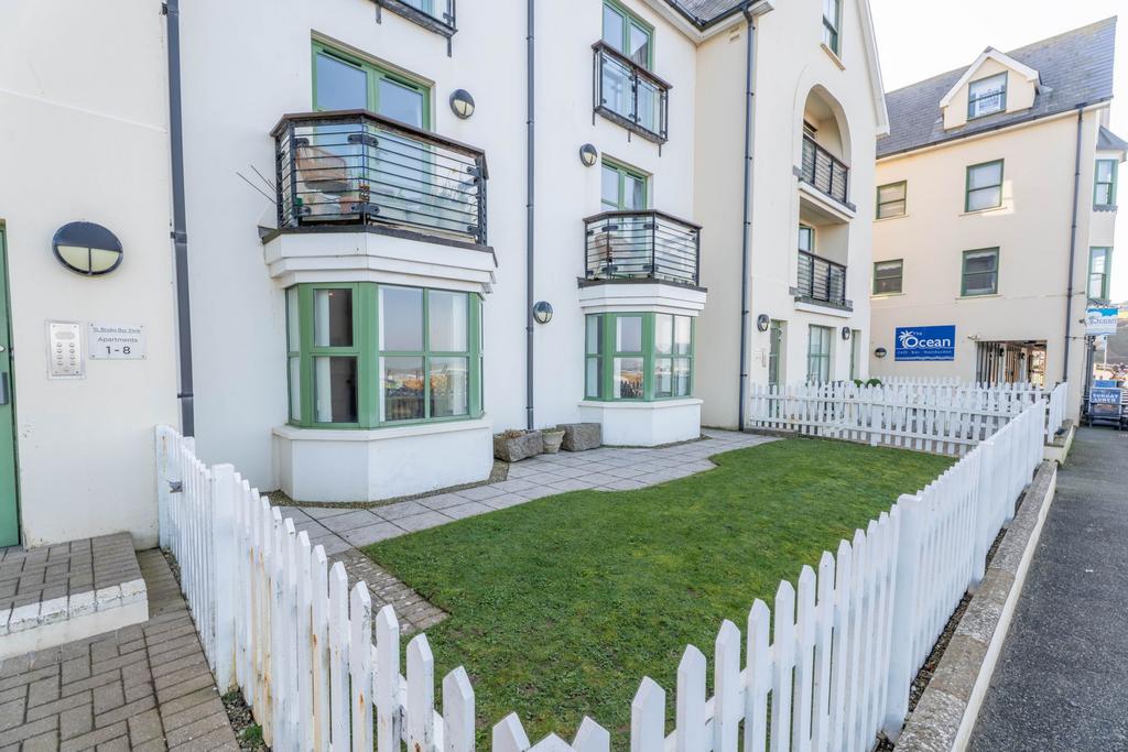 Gated front garden with picket fence
