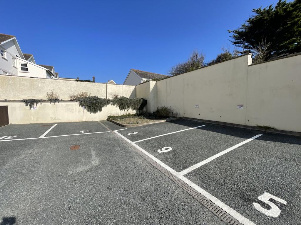 TWO Designated car parking spaces plus communal...