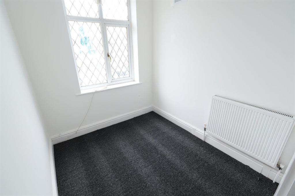 Bright small bedroom with fresh white walls...