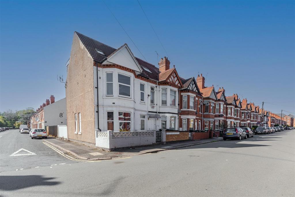 Well-maintained Victorian-style terraced corner...