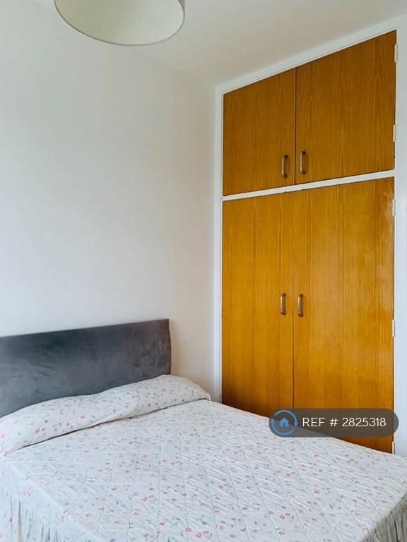 High Ceiling + Large Built-In Wardrobes