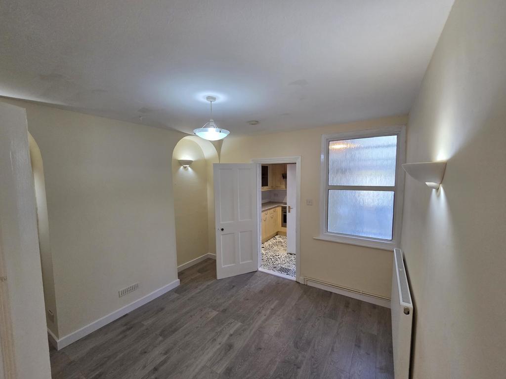 Bright lounge with modern flooring and neutral D...