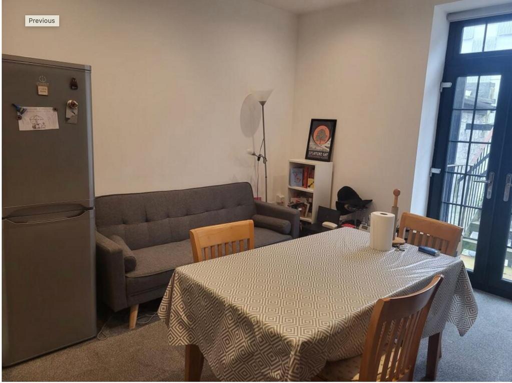 Bright lounge with dining table and sofa...