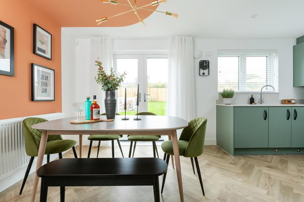 Double doors lead from the dining area to the...