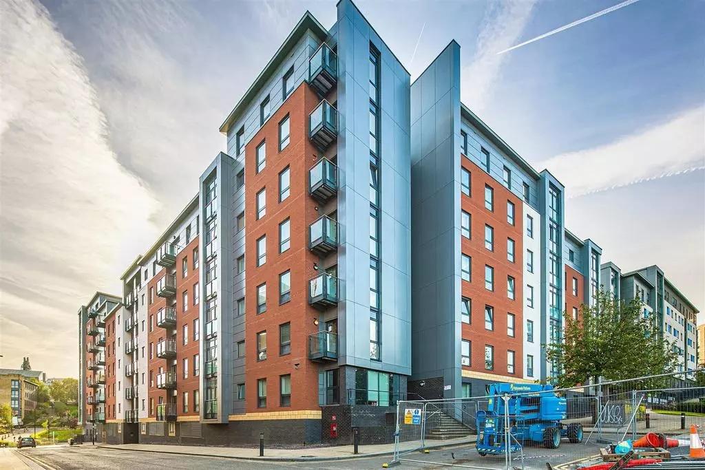 Modern multi-storey residential building with c...