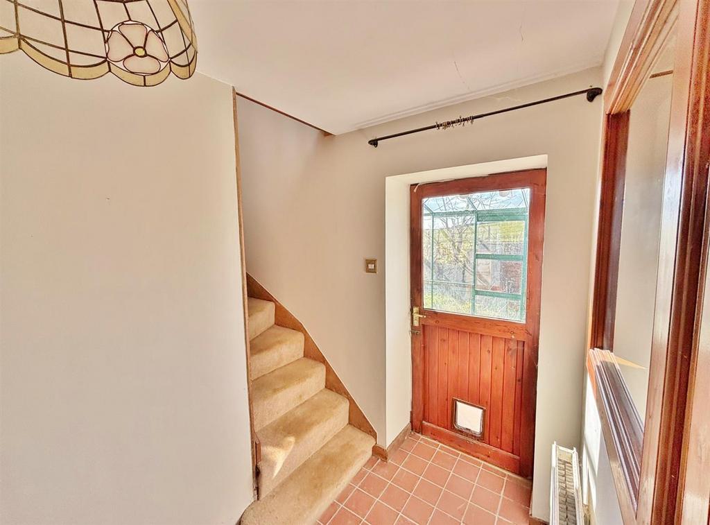 Hallway to garden room and stairs up
