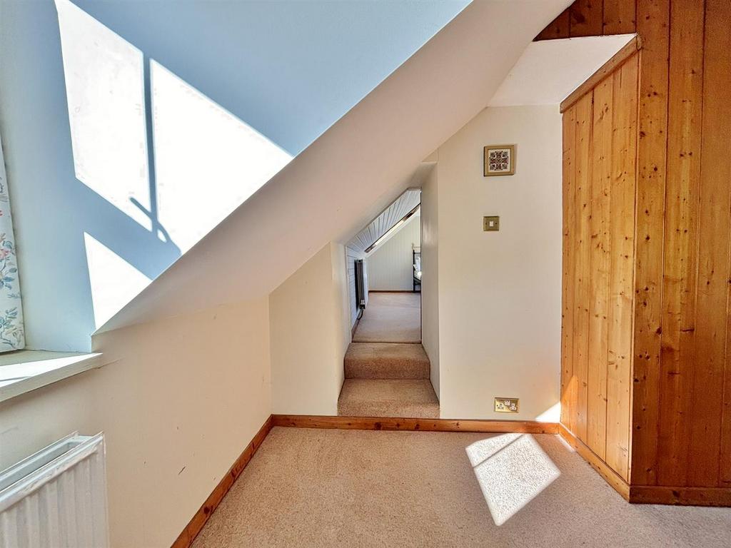 Upper hallway to bedroom 4 from bedroom 3