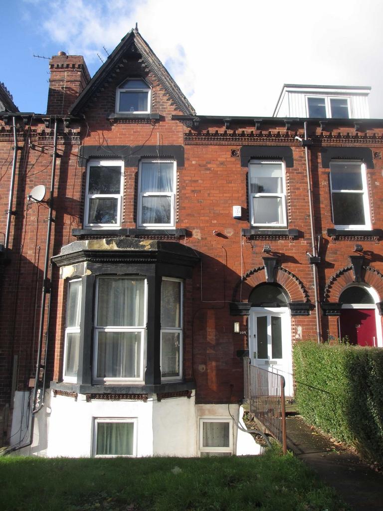 An exterior view of a charming brick house show...