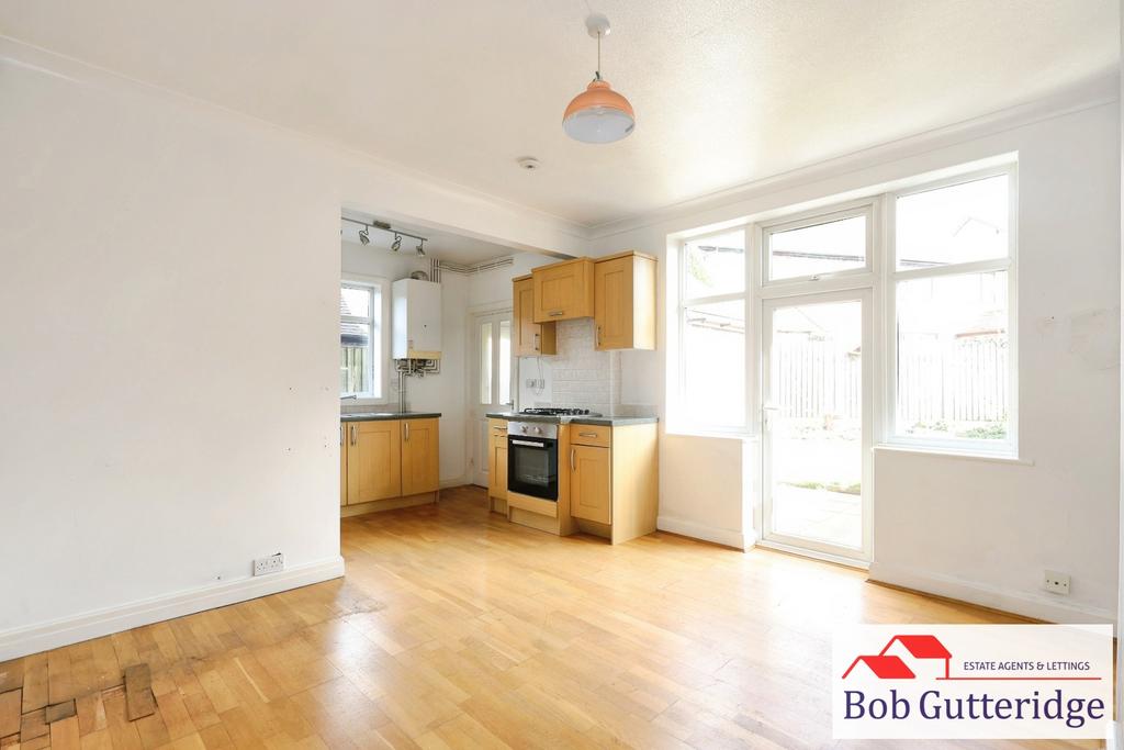 Open plan fitted kitchen / dining room