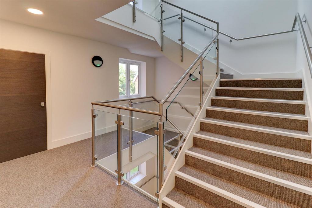 Communal Stairwell/Lift Access