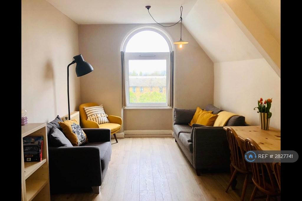 Open-Plan Living Room Opposite Kitchen.
