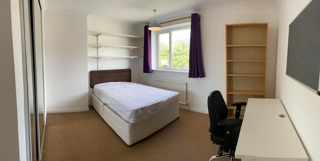 Bright, well-presented bedroom with a comfortab...