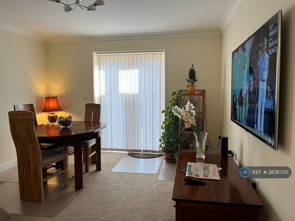 Dining Area With Wall Mounted Tv