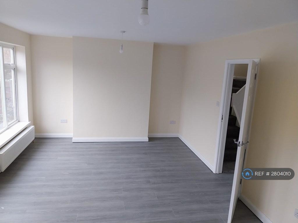 Spacious Living Room Leading Out To Kitchen Area