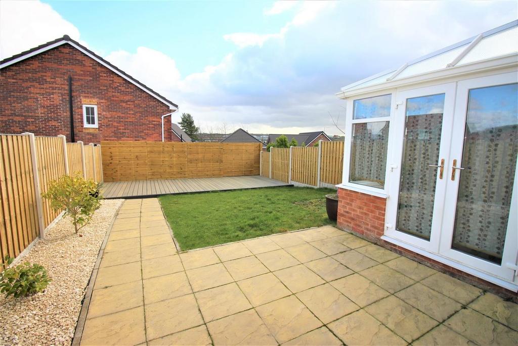 Private low-maintenance garden with patio area...