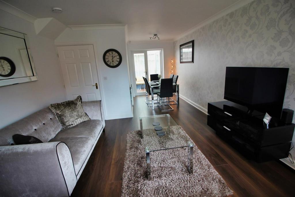 Bright, modern lounge with dining area...