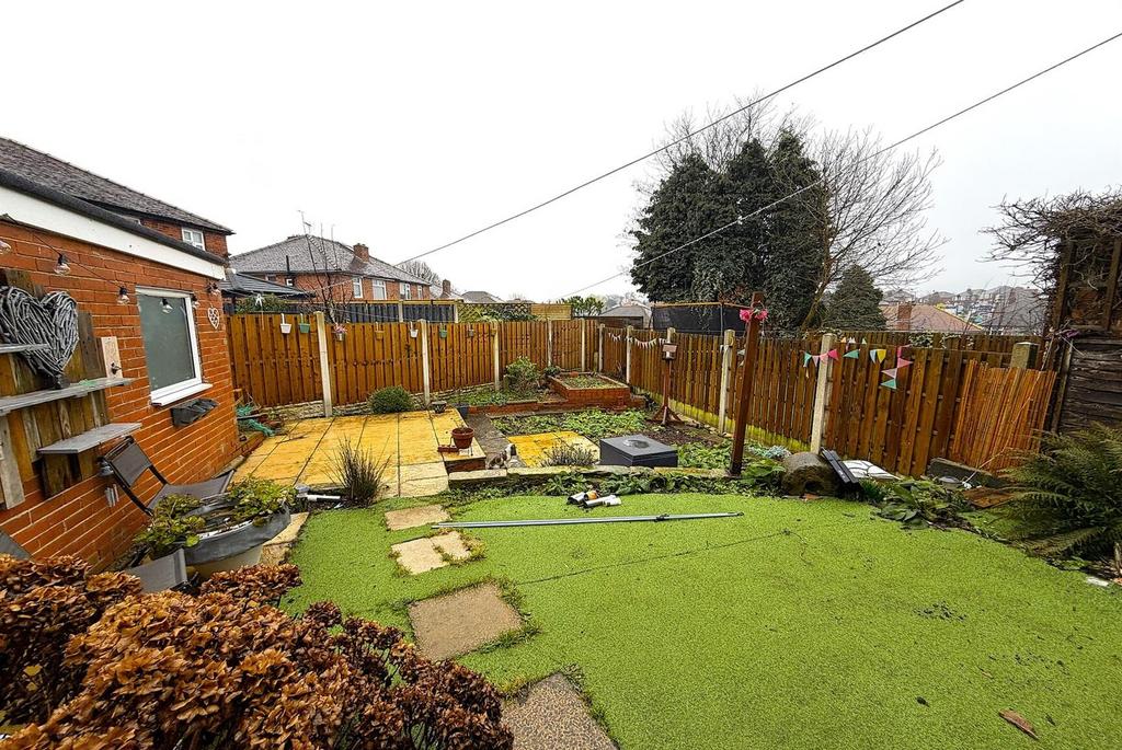 Private fenced garden with lawn and patio area...