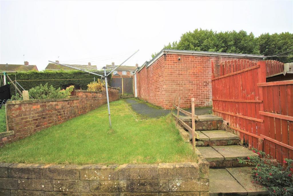 Private rear garden with lawn and patio steps...