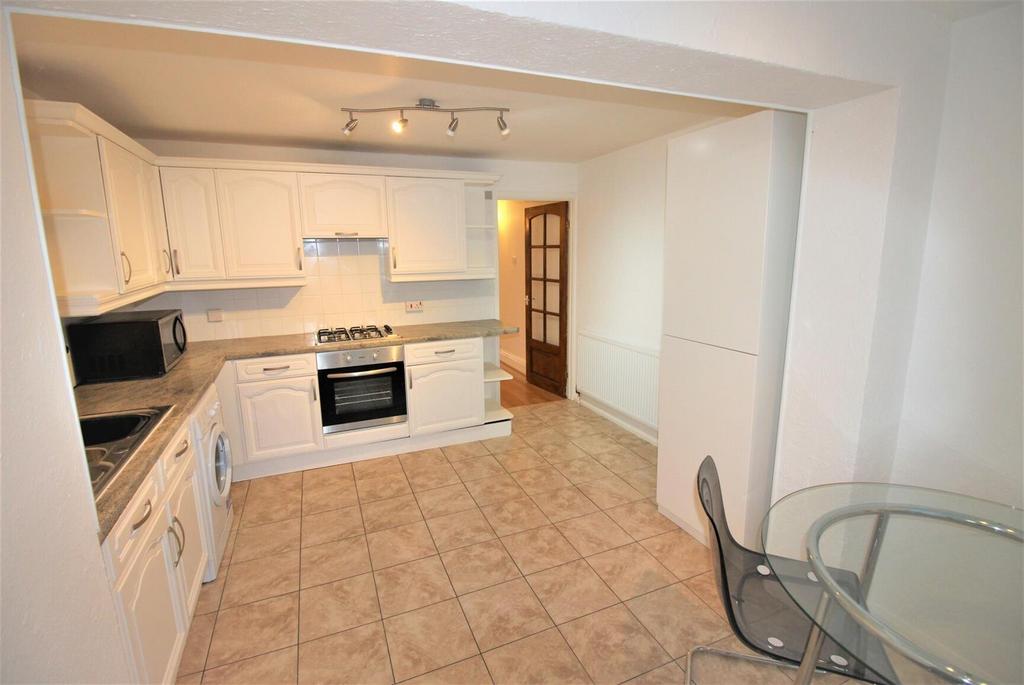 Bright modern kitchen with dining space...