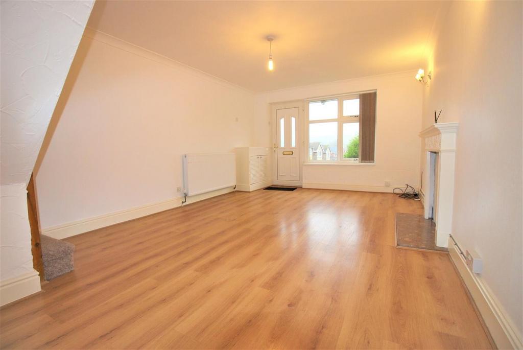 Bright, spacious lounge with wood flooring...