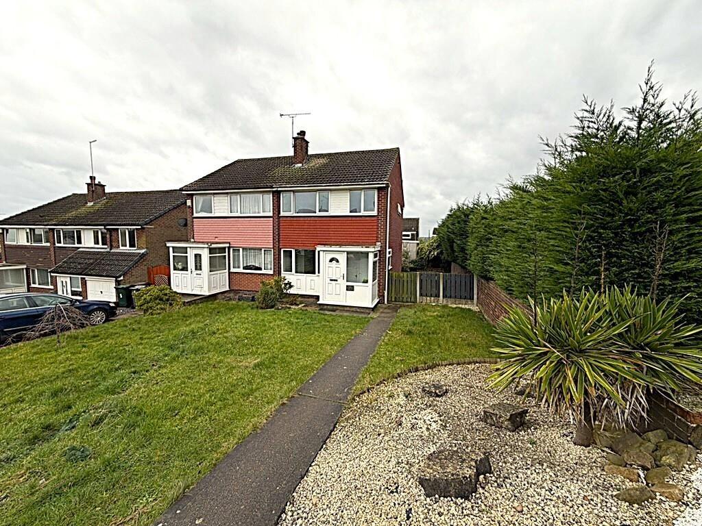 Semi with front lawn and private driveway...