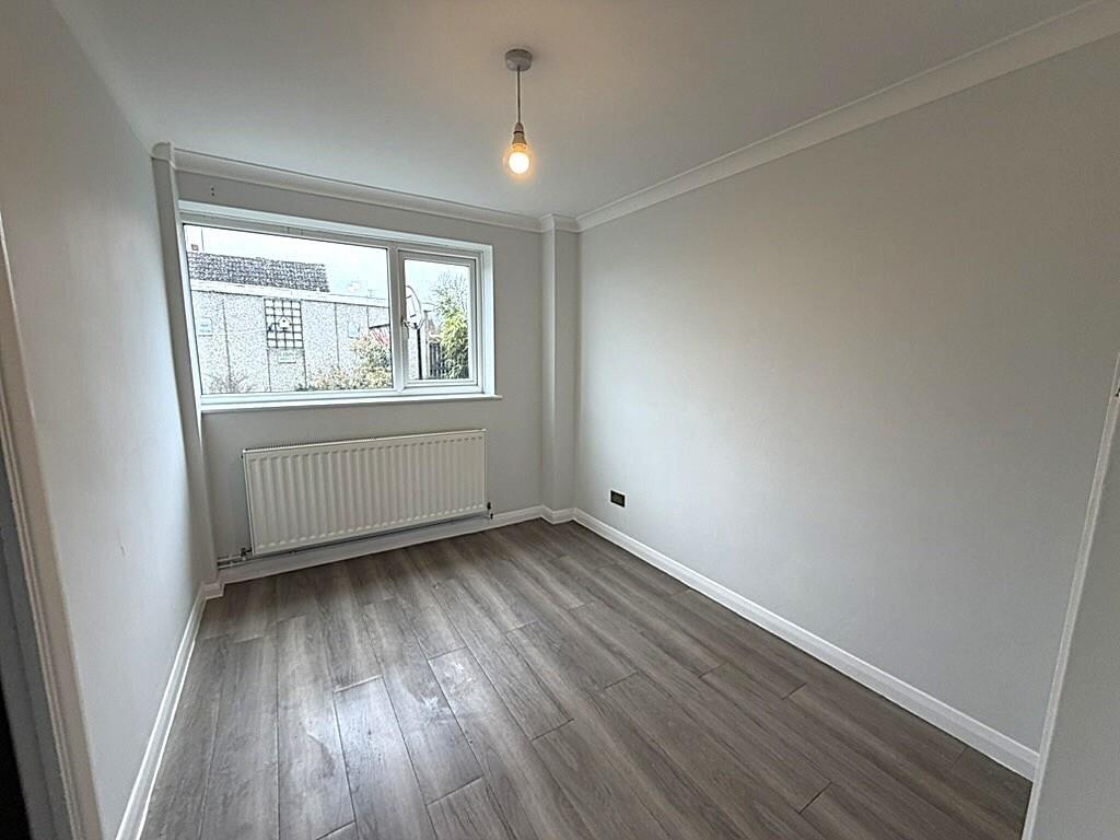 Bright, freshly painted bedroom with new floori...