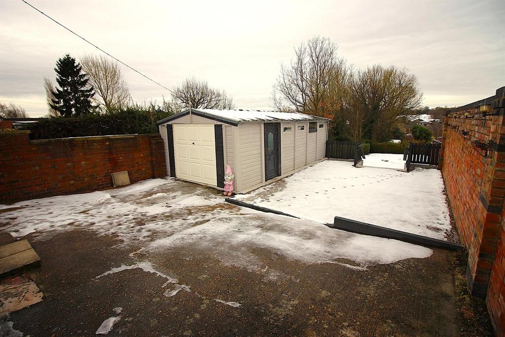 Private rear yard with parking and outbuilding...