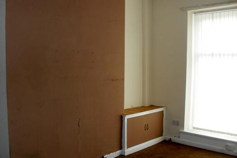 undefined, two bed terraced house on ground floor.