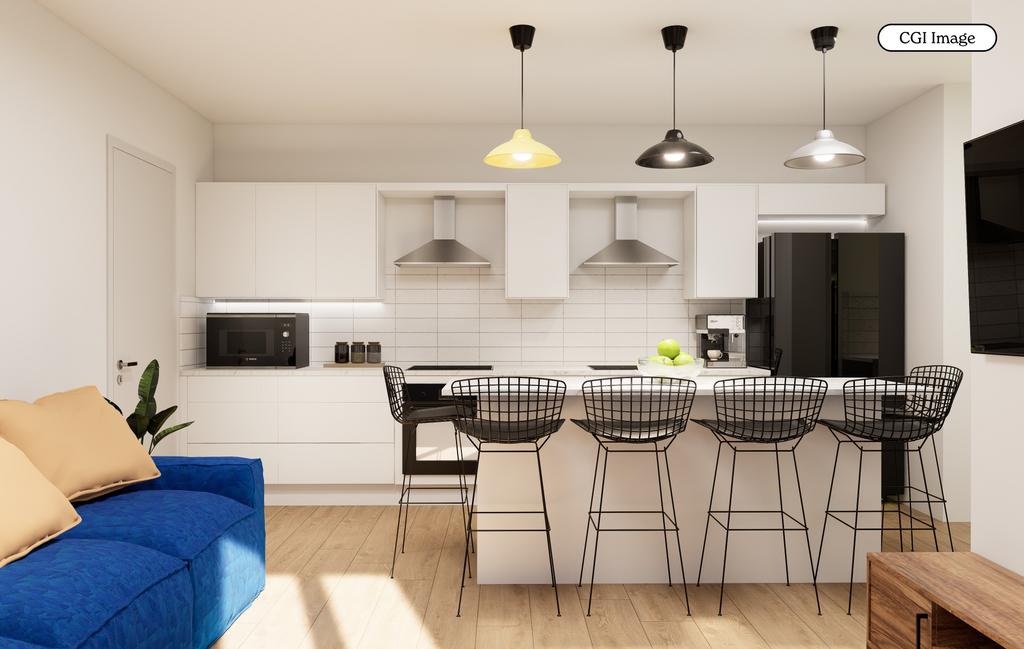 Bright modern kitchen with breakfast bar seatin...