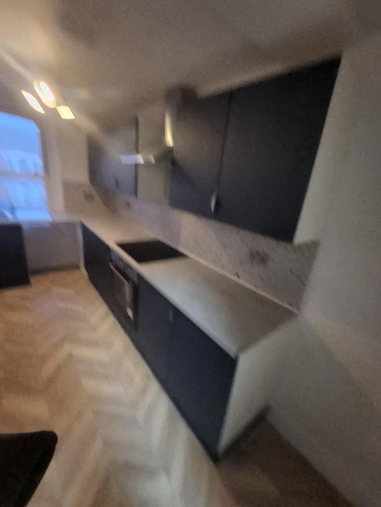 Modern galley kitchen with fitted cabinets...