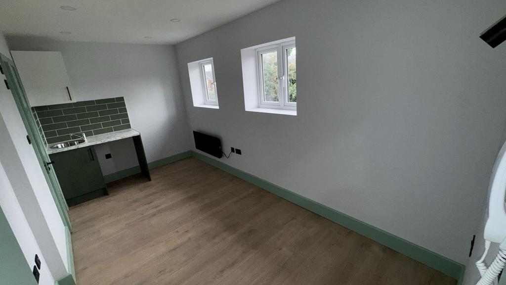 Bright compact studio with kitchenette...
