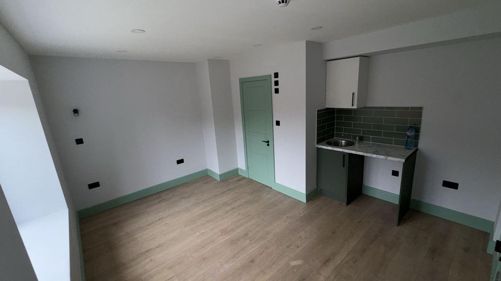 Bright studio-style room with kitchenette...