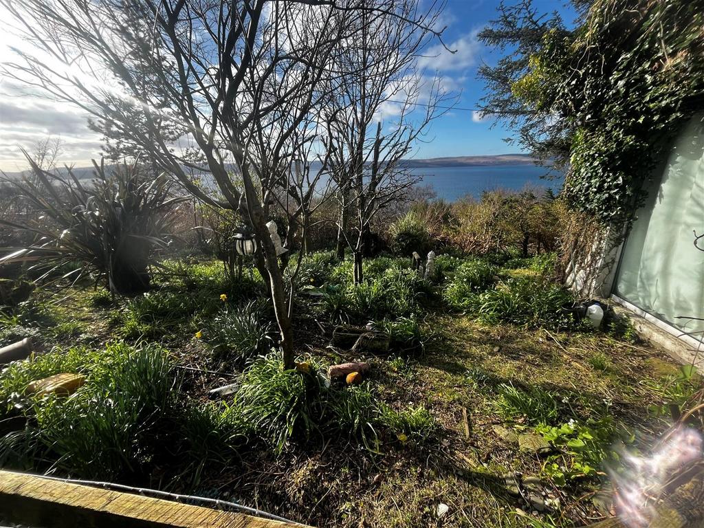 Front garden sea view from Crimmond, Penrioch