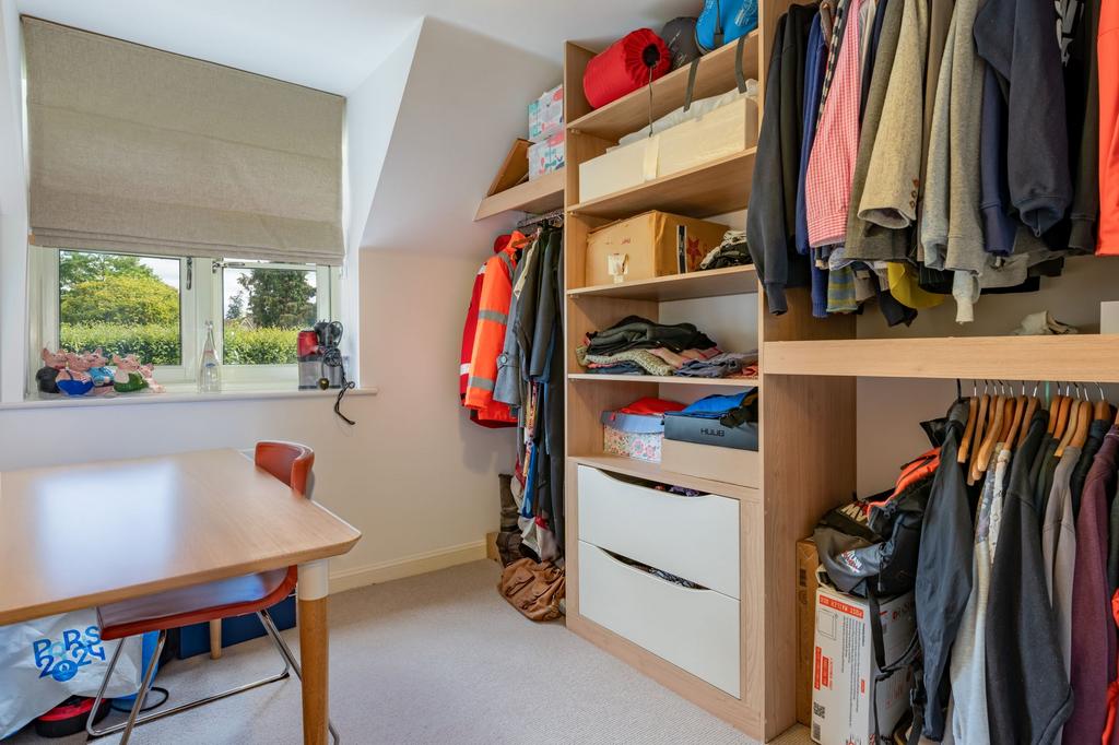 Master bedroom enjoys an adjoining dressing room