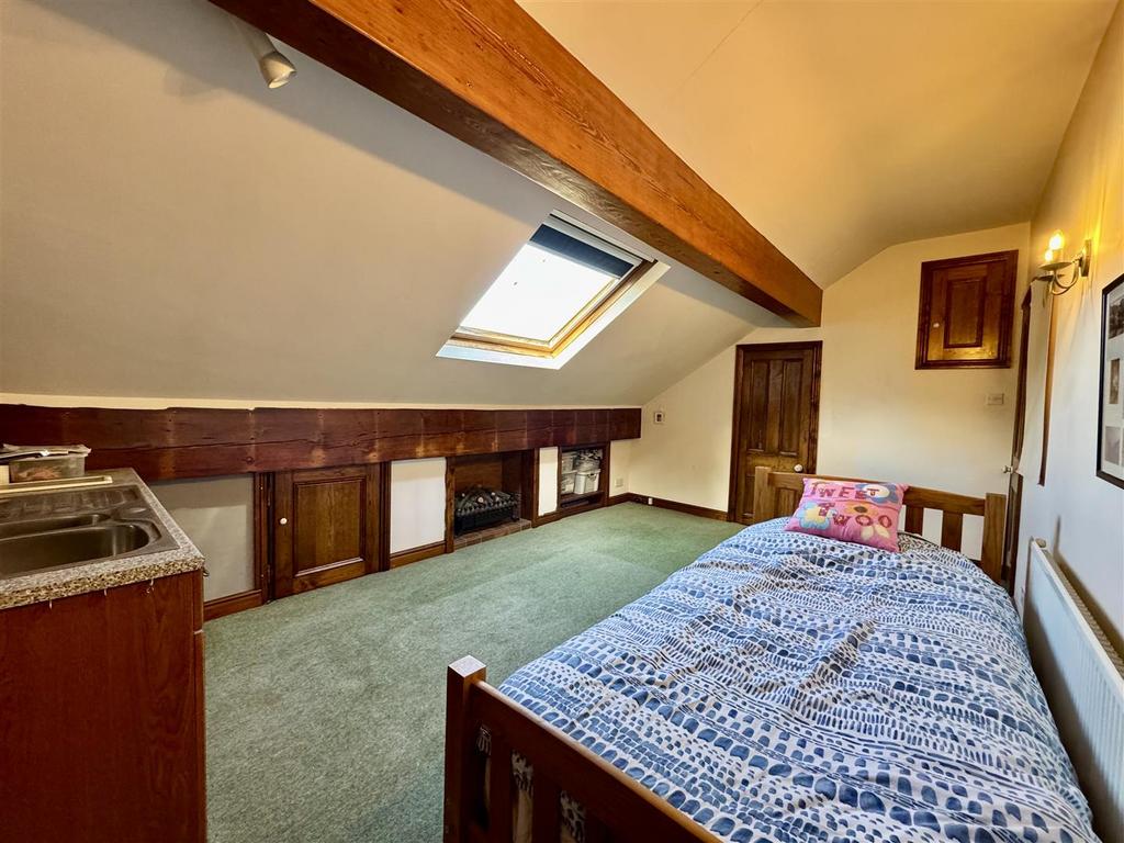 Bedroom four with kitchenette