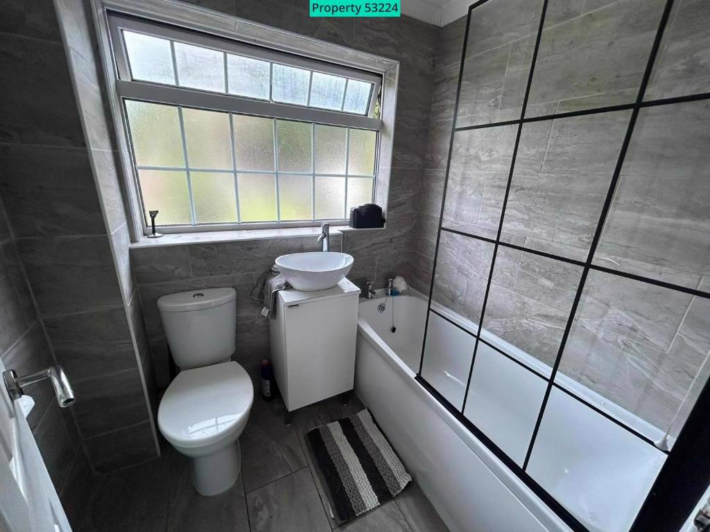 Modern bathroom with bath and shower