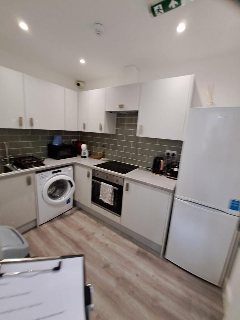 Modern fitted kitchen with appliances...