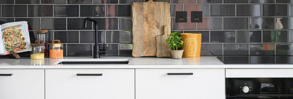 Glasswater-locks, A close up image of a Kitchen...